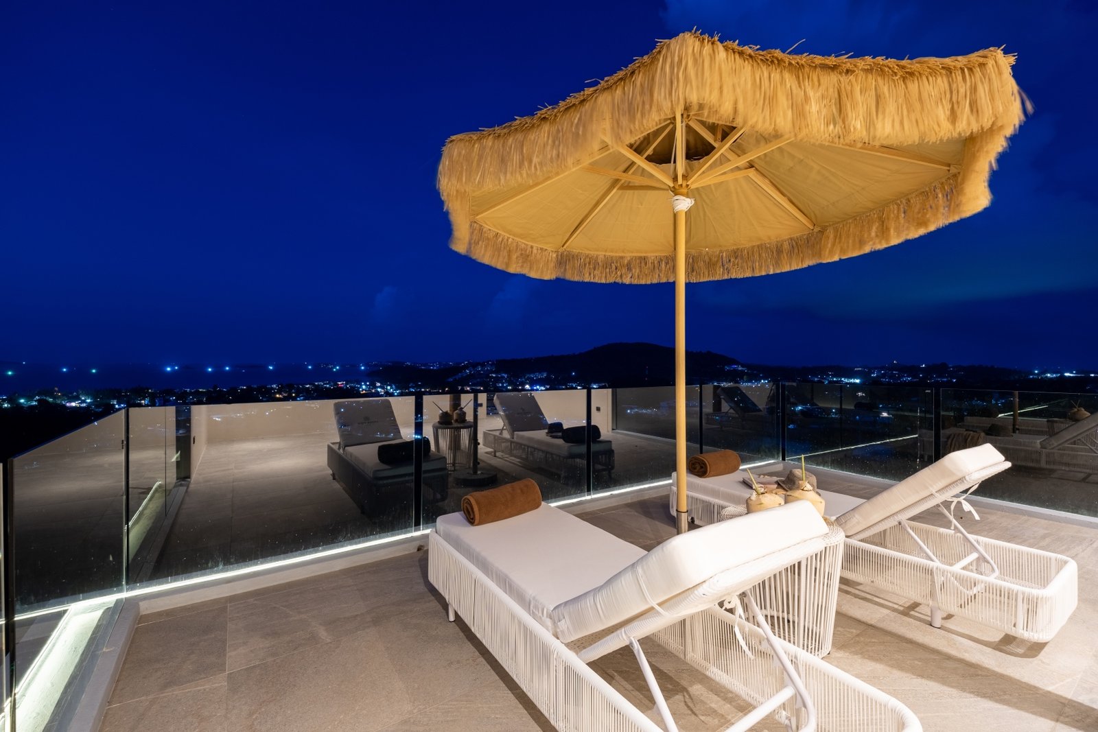 Private rooftop deck at dusk